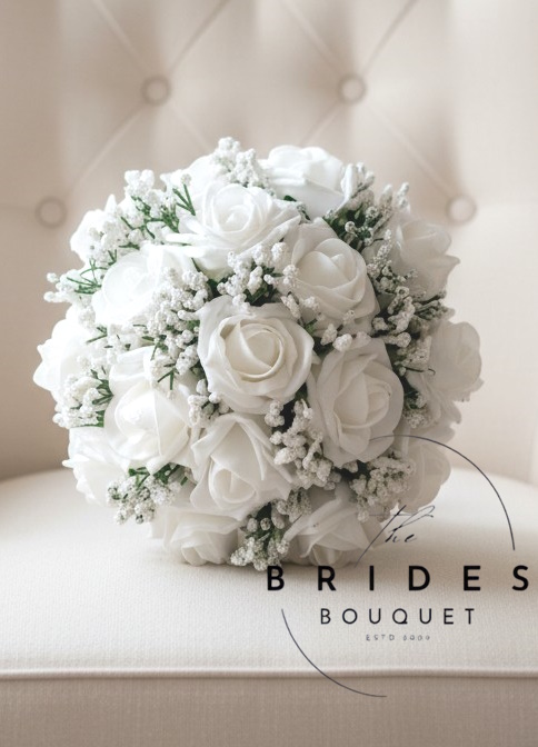 bridesmaids bouquets of white roses with masses of gypopshila baby breath