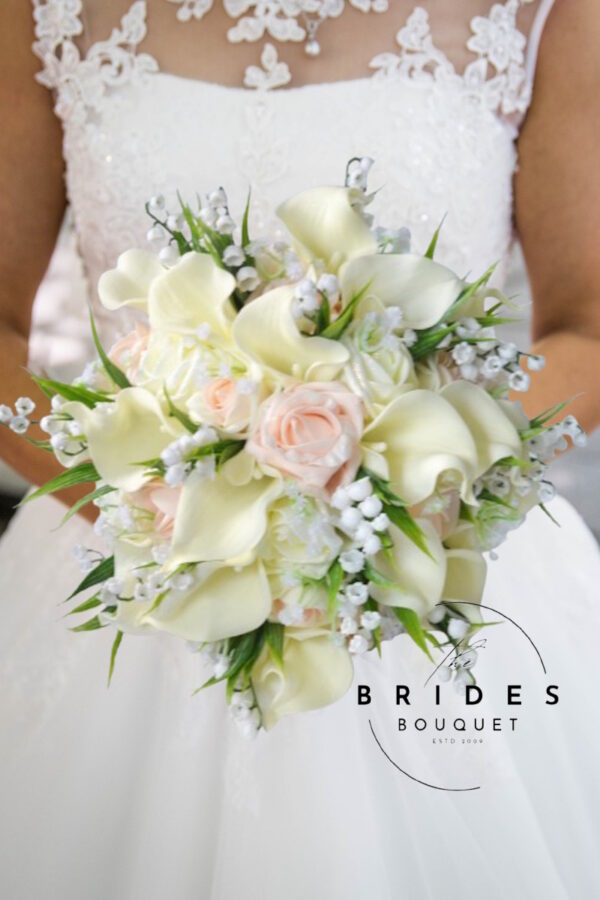 pink blush wedding bouquet with cream calla lily