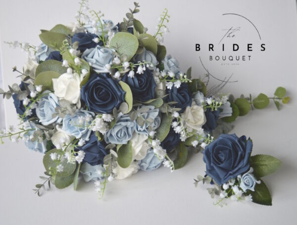 Florist’s Choice bridal bouquet in navy, dusky blue, and white for a Winter wedding, fully handmade with ribbon-wrapped handle.