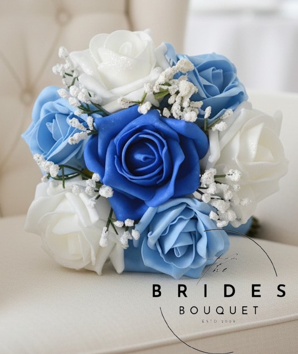 flower girl bouquet of any colour roses with masses of gypsophila blue rose version