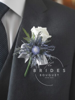Artificial thistle wedding flowers buttonhole with faux rose for Scottish wedding
