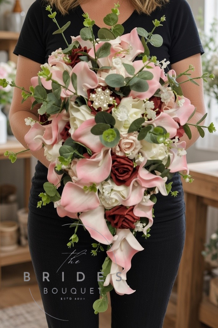 blush pink calla lily brides tear bouquet with roses and eucalyptus wedding flower tear