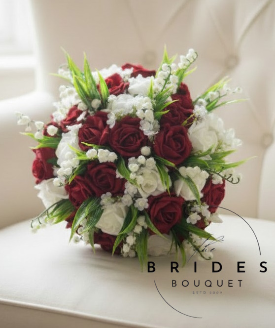 bridal bouquet of artifical roses with lily of the valley burgundy brides wedding flowers uk