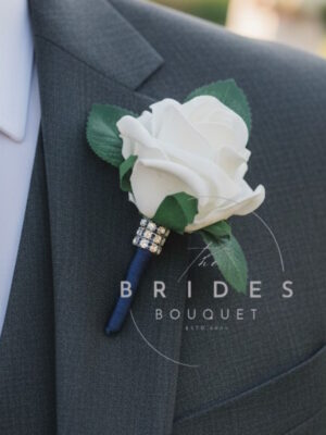 Rose wedding buttonhole with diamante trim artificial corsage