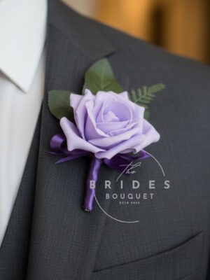 artificial rose and fern leaf buttonhole any colour lilac example