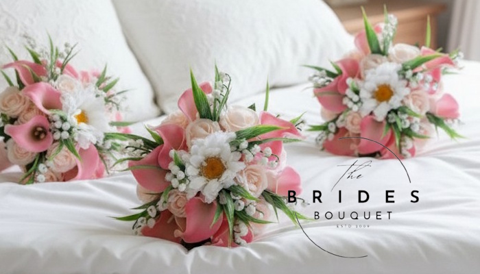 bridesmaids bouquets of gerbera call lily rose and lily of the valley pink white