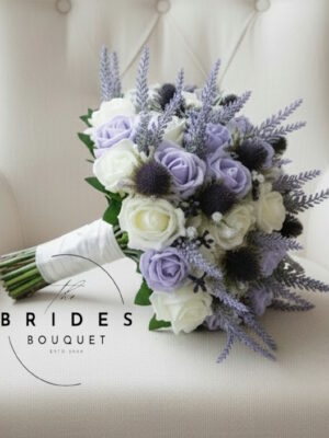 Purple thistle and heather wedding bouquet with artificial roses and gypsophila