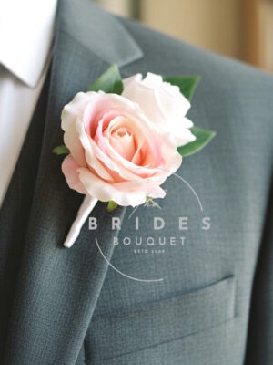 silk rose boutonniere by the brides bouquet uk