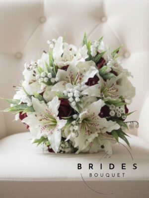 Tiger lily wedding bouquet with roses and lily of the valley