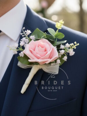 grooms buttonhole rose lily of the valley and eucalypyus