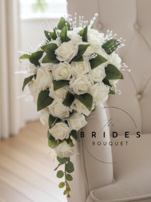 Artificial teardrop wedding bouquet made with faux roses in a custom colour combination