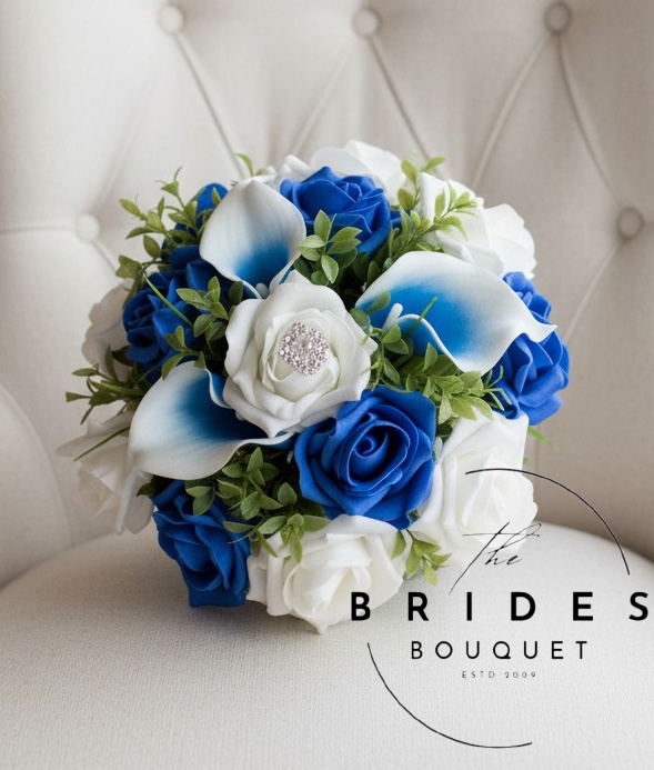 bridesmaid bouquet of faux roses and calla lily with tea leaf leaves