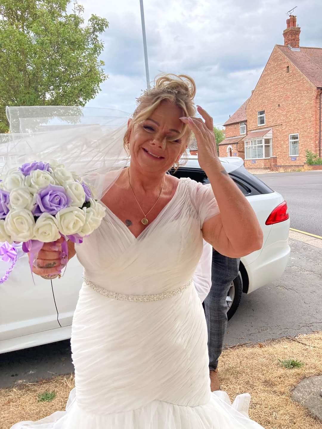 artificial-wedding-bouquet-in-lilac-and-ivory-real-life-bride-with-bouquet-by-the-brides-bouquet-uk