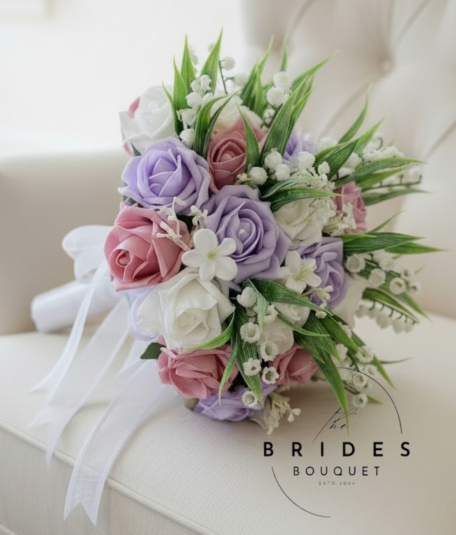 dusky pink lilac white rose wedding bouquet with lily of the valley by the brides boquuet uk