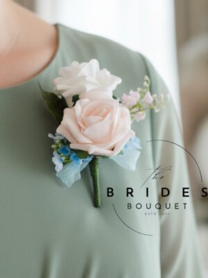double rose spring wedding flower buttonholes corsage roses lily of the valley and forget me nots