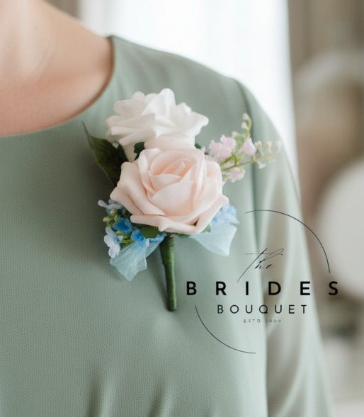 mother of the bride artificial wedding corsage buttonhole roses lily of the valley and forget me nots double rose spring wedding flower buttonholes corsage roses lily of the valley and forget me nots