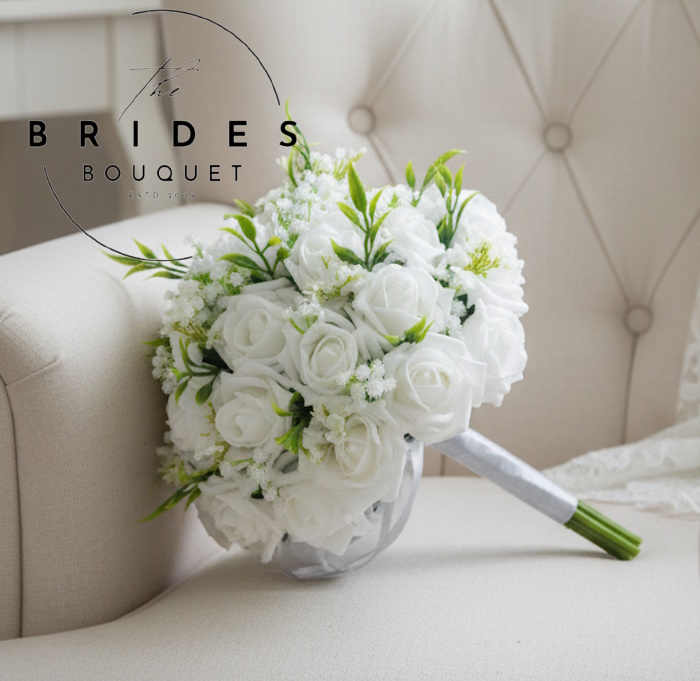 beautiful bouquet of artificial roses with fern and gypsophia natural look bridal flowers in any colours