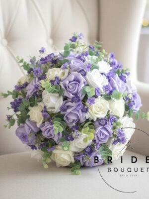 bridal bouquet with artificial roses, eucalyptus, and purple gypsophila