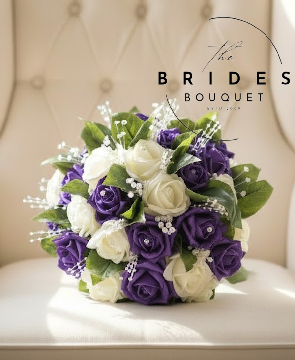 purple artificial wedding bouquet of roses with crystals and pearls