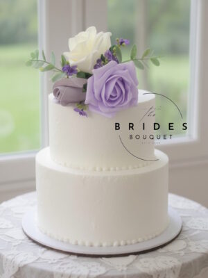 Artificial cake toppers with roses eucalyptus and coloured baby breath - all made to order in custom colours
