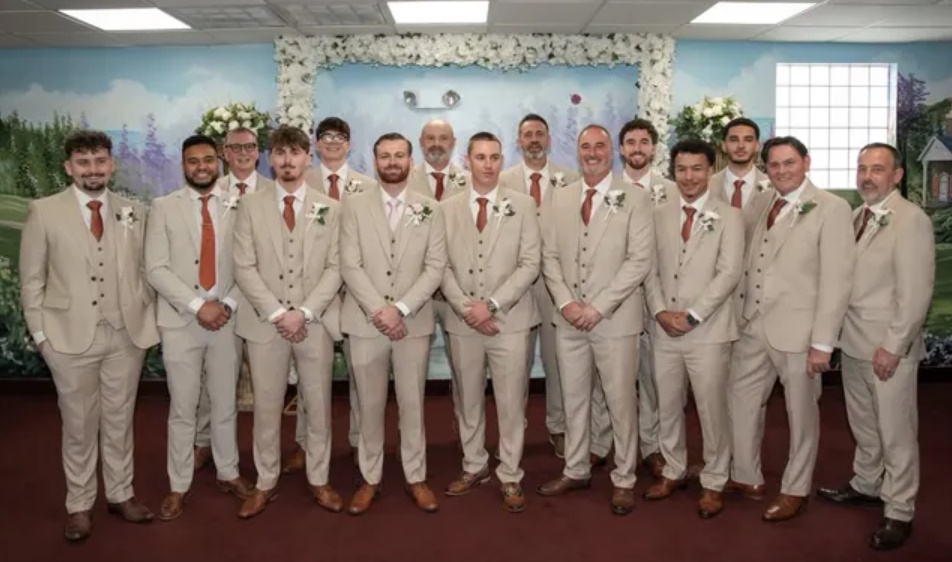 grooms party with wedding buttonholes created by the brides bouquet uk