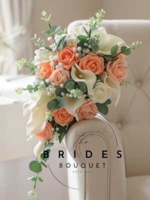 Peach rose small tear bouquet with ivory calla lilies, white gypsophila and eucalyptus