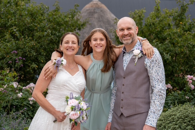 bride groom and bridesmaid real life wedding elopment with silk heather peony bouquet craeted by the brides bouquet uk