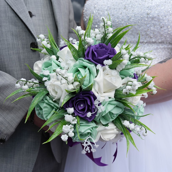 purple and mint wedding bouquet from the brides bouquet uk at real life wedding