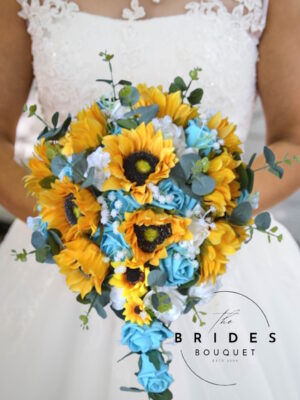 artificial bridal bouquet featuring large silk sunflowers, delicate gypsophila, lush eucalyptus, and customizable rose colors, arranged in a cascading teardrop shape