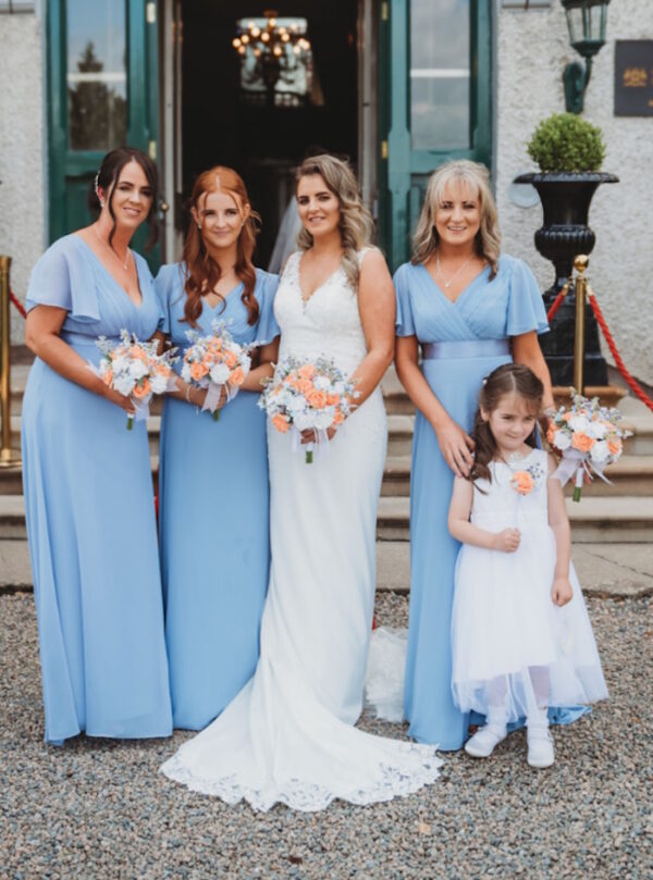real life bride with her bridesmaids and artificial bridal flowers from the spring range by the brides bouquet uk