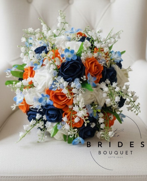 spring summer wedding bouquet with lily of the valley and forget me nots orange navy white