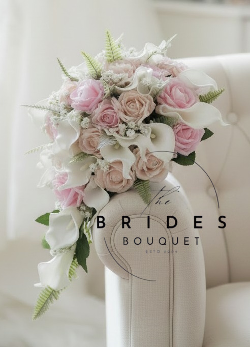 brides teasrdrop bouquet with roses calla lily and fern leaf