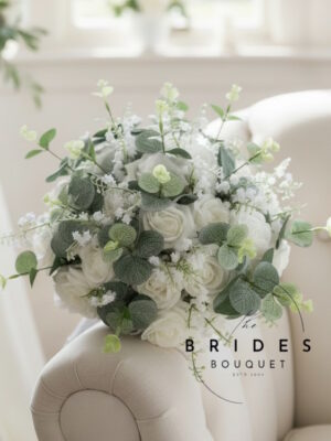 white faux rose artificial wedding bouquet with lily of the valley and eucalyptus