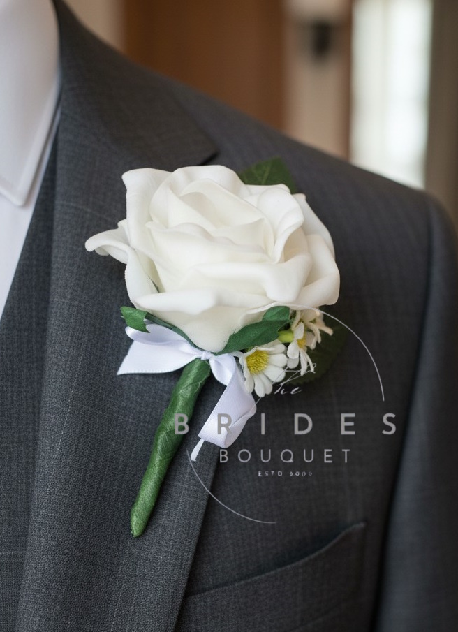 artificial rose and daisy wedding buttonholes for guests