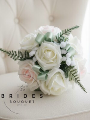 Flower girl bouquet with ribbon twists, artificial roses, gypsophila and fern leaves in your chosen colours