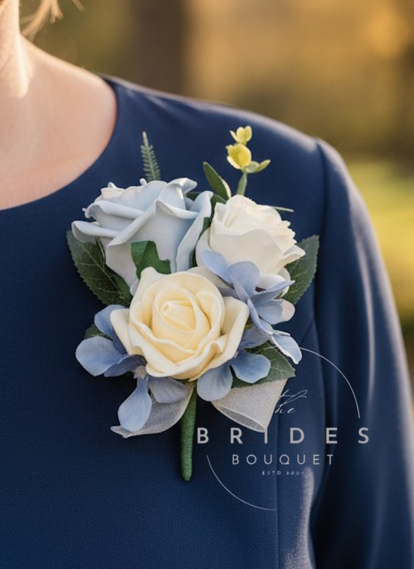 mother of the bride wedding buttonhole roses hydrangea and foliage artificial silk