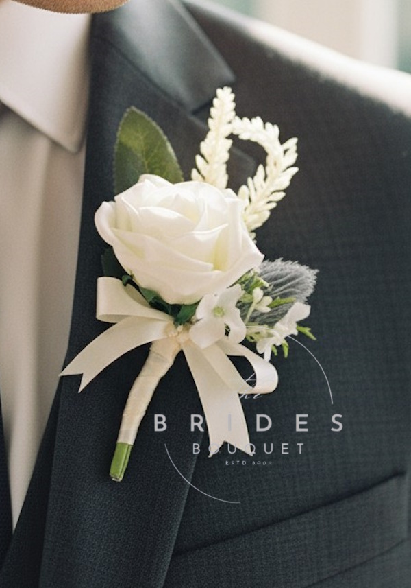 artificial rose heather and thistle wedding buttonhole grooms
