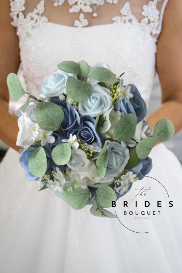 Dusky blue wedding bouquet with ivory roses and eucalyptus
