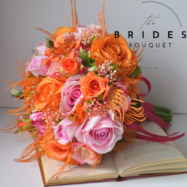 Orange and pink silk bridal bouquet with matching buttonholes