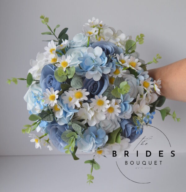 Dusty blue silk bridal bouquet with roses, hydrangea, daisies and eucalyptus