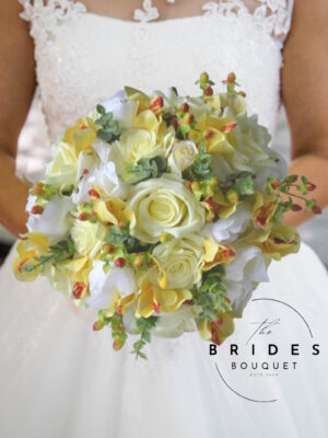 Lemon and white bridal bouquet with silk roses and orchids