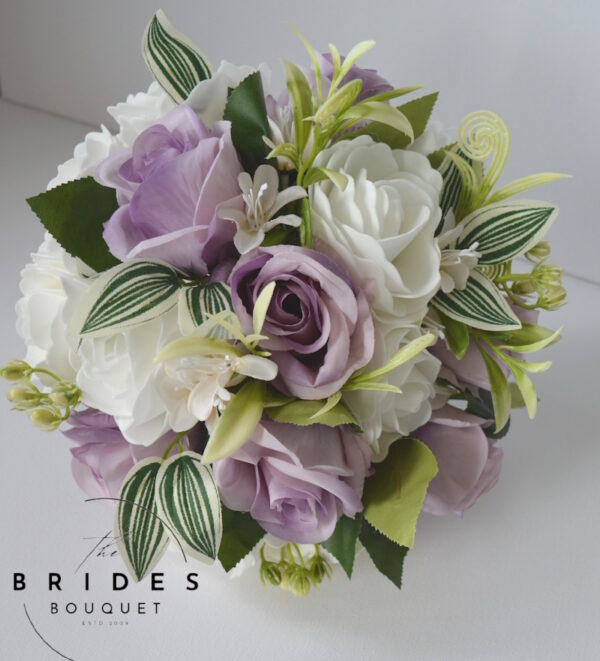 Dusky lilac and white rose wedding bouquet with silk roses and natural stems