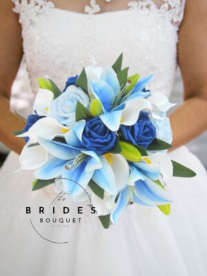 Blue tropical lily wedding bouquet with white calla and blue roses