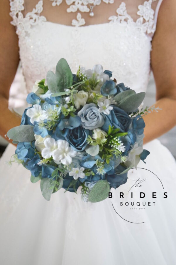 Natural look dusty blue silk wedding bouquet with roses, hydrangeas, and greenery