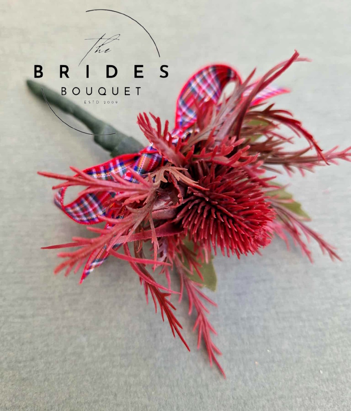 burgundy thistle wedding buttonholes artificial thistles socttish bridal flowers tartan Red thistle wedding buttonhole with artificial sea holly corsage
