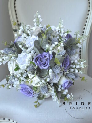 lavender lilac wedding bouquet with roses and thistles