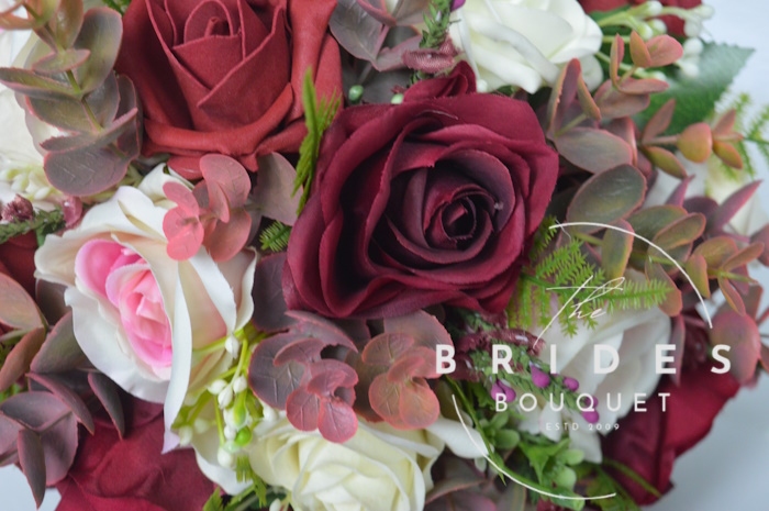 burgundy an dblush silk rose wedding bouquet close up bridal flowers with heather and eucalyptus