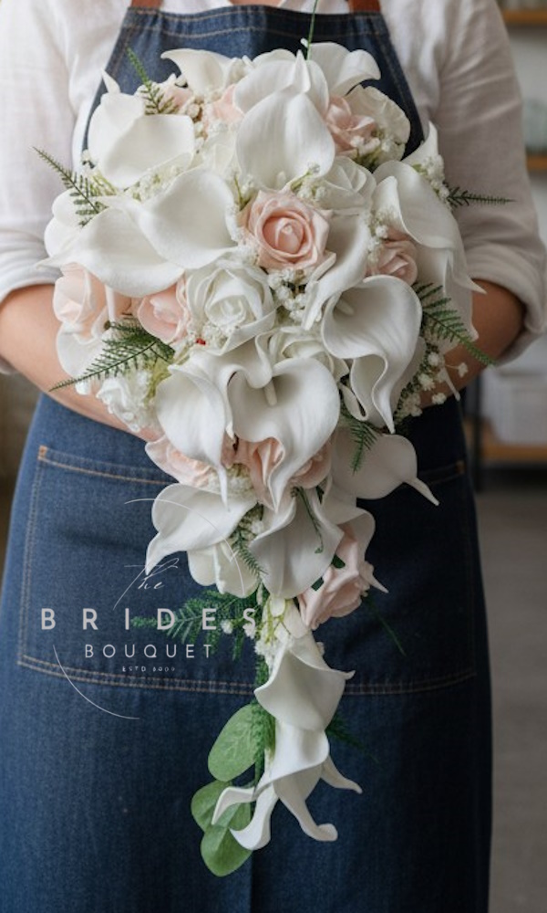 rose and calla lily wedding teardrop bouquet with gypophila and fern