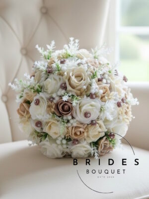 Beige wedding bouquet with latte, ivory and pearlised crème roses and gypsophila.