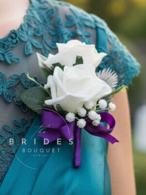 Scottish thistle wedding buttonhole with double artificial roses, gypsophila and ribbon including tartan